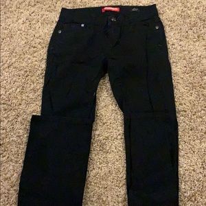 Black skinny boot pants.